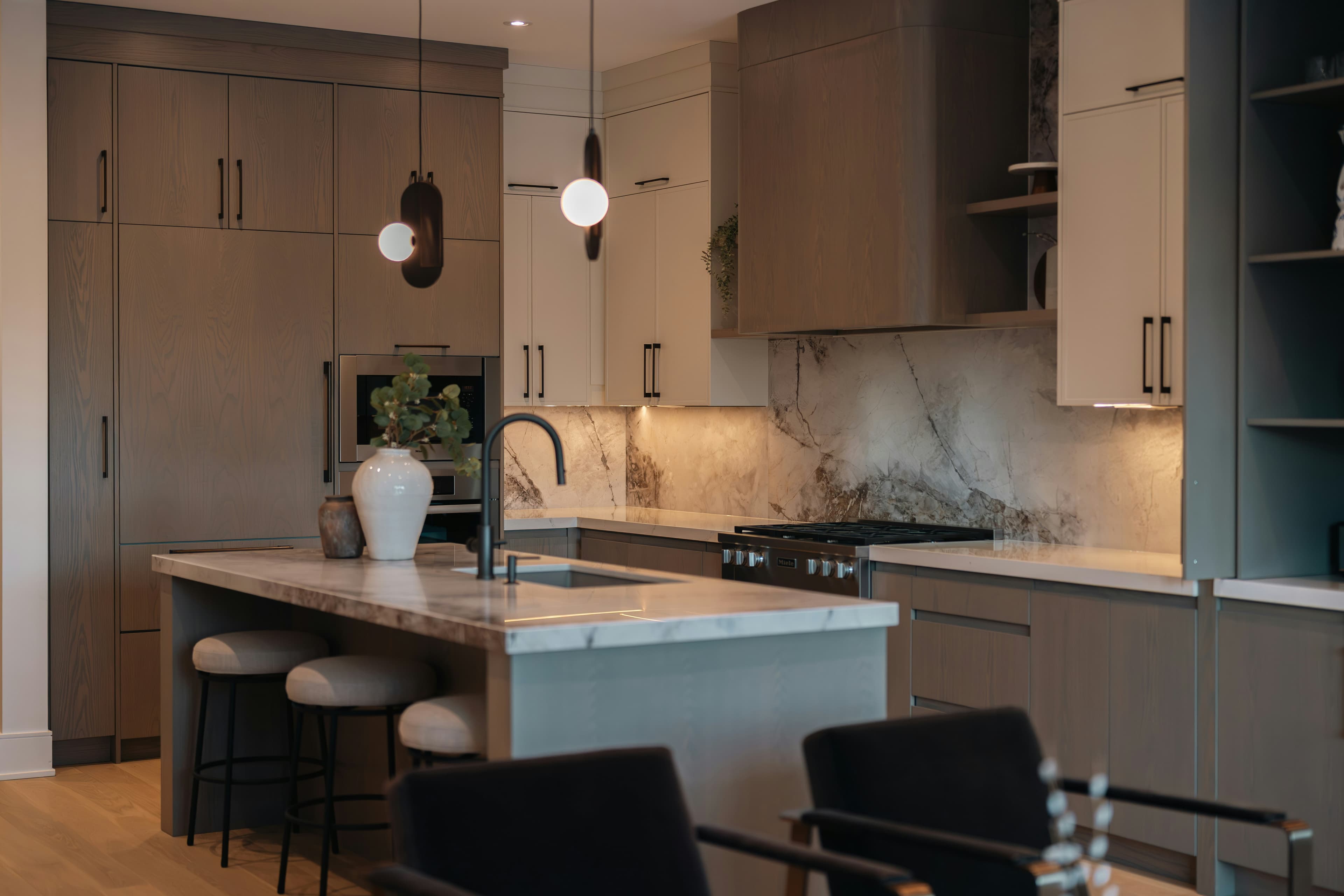 Shaker kitchen with warm cabinetry and worktops