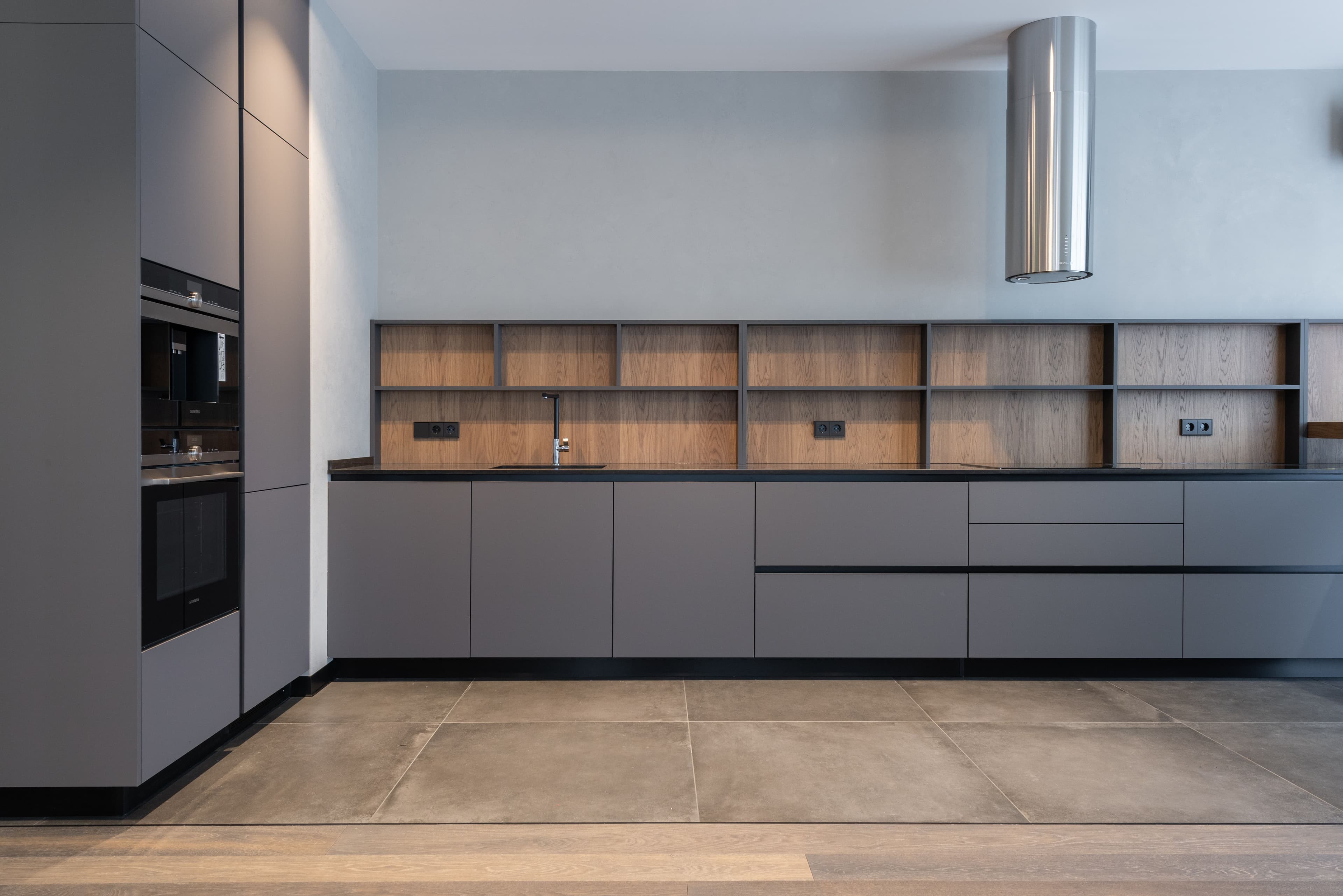Handleless kitchen with flat-front cabinetry